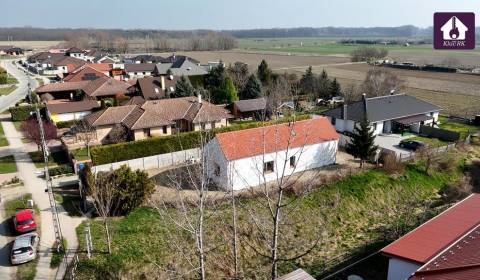  Novostavba malebného domčeka na priestrannom pozemku.Rajka